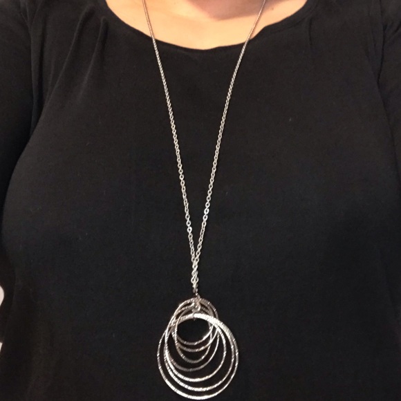 Long silver tone necklace with circle pendant - Picture 1 of 3